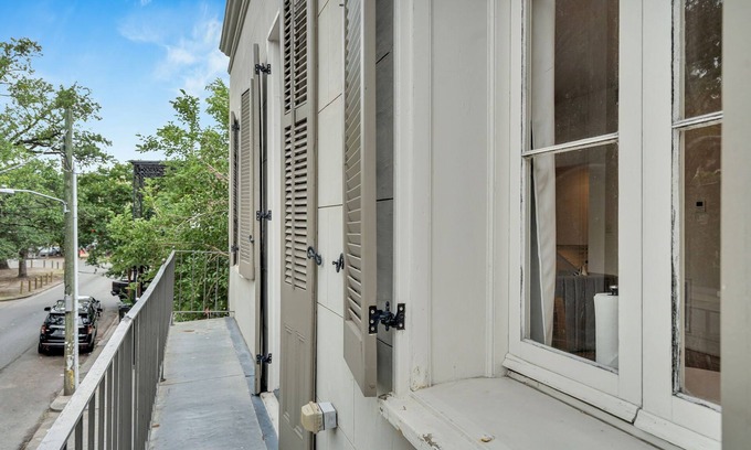 Faubourg Marigny Hotel | Stay in the center of the action with this charming 1-bedroom retreat located on the historic Esplanade Avenue. This unique space combines timeless New Orleans elegance with modern comfort, offering a serene escape just steps from Frenchmen Street.