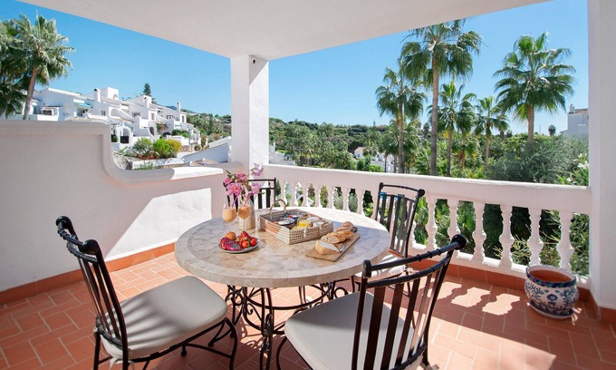 Nerja Apartment | Stay in tropical garden within walking distance to sea and Nerja town