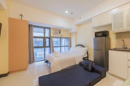 Pinagsama Apartment | StayHere at Viceroy McKinley Hill Relax & Unwind