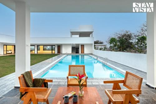Hyderabad Villa | StayVista at AJ House with Pvt Pool & Projector Set-up