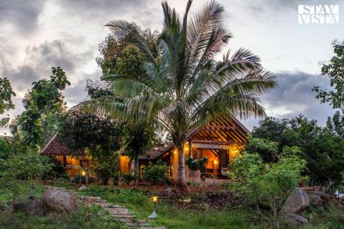 Doddaballapur Villa | StayVista at The Clay Courtyard with Wi-Fi, BBQ