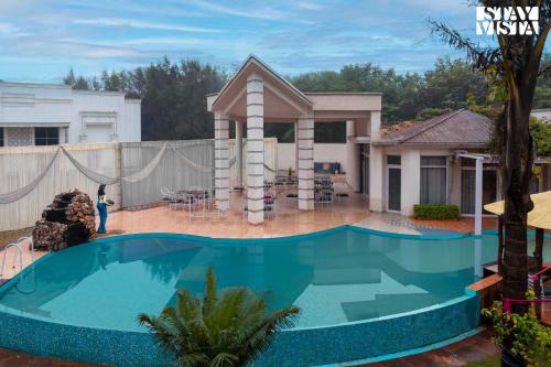 Landran Villa | StayVista's Casba Farm Retreat - Pet-Friendly Villa with Rooftop Lounge, Outdoor Pool, Lawn & Bar