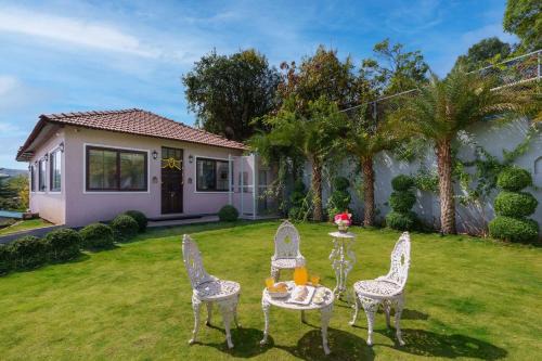 Bhilar Villa | StayVista's Lawn House at Sula Wada - Vintage-Charm Cosy Home with Swimming Pool and Indoor Activities