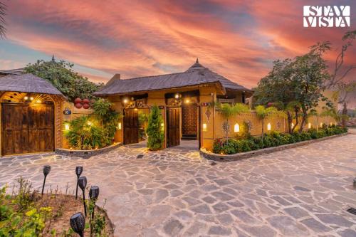 Ajmer Villa | StayVista's Majestic Mud House - Rajasthani Architecture with Modern Amenities, Outdoor Pool, Adventure Activities, and Spa