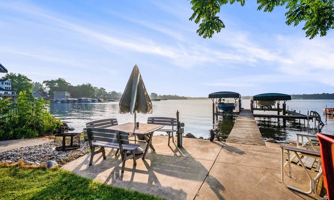 Paw Paw Lake House | Stealth Cottage | Lakeside historic stay with a dock, bars, and athletic courts