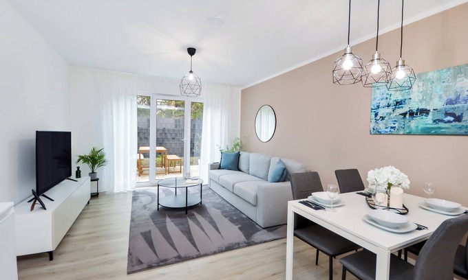 Brackwede Apartment | Stil und Komfort Terrasse - Parkplatz