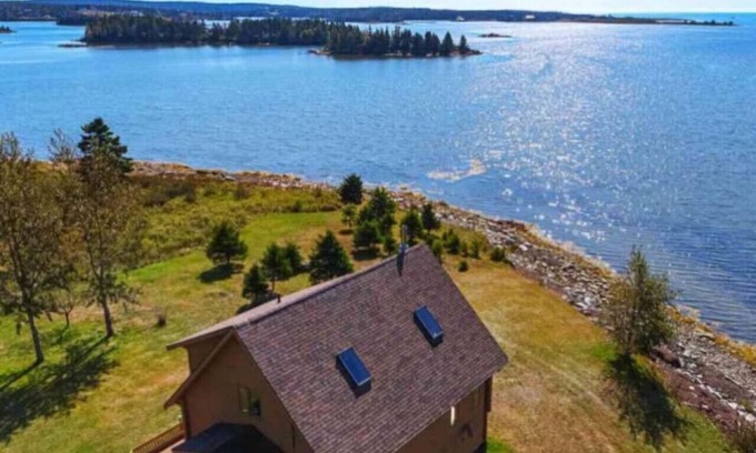 Halifax County House | Still Water Shores: Ostrea Oceanside Loghouse