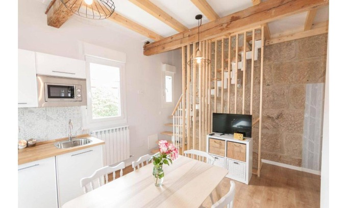 Redondela Apartment | Stone duplex apartment near the sea.