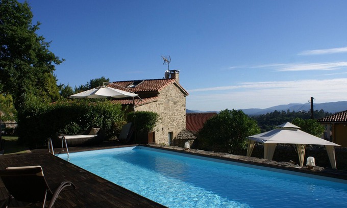Santiago de Compostela Cottage | Stone house with pool and garden.