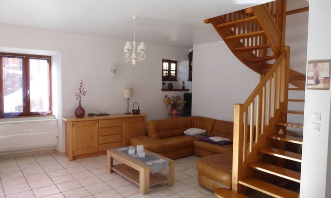 Besse House | Stone house with terrace in typical mountain village on GR 54