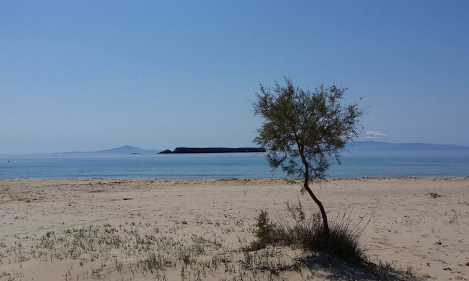 Chrissi Akti House | Stone sea view house with a beautiful garden close to an amazing sandy beach