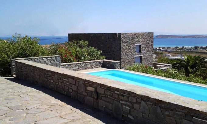 Chrissi Akti House | StoneHouse by the pool