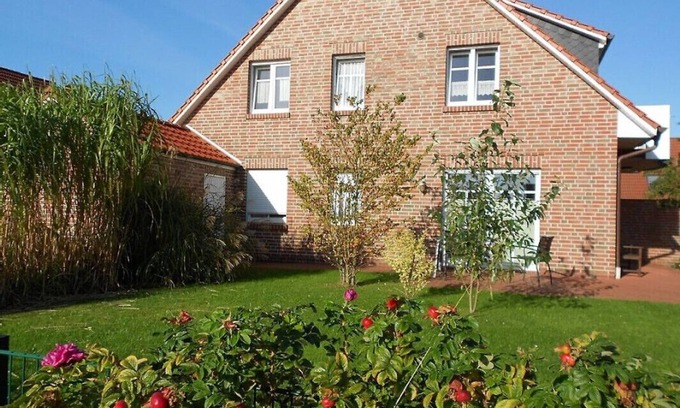 Norddeich Apartment | Strandnahe Ferienwohnung mit Terrassen und Garten Strandkorb am Sandstrand Inkl