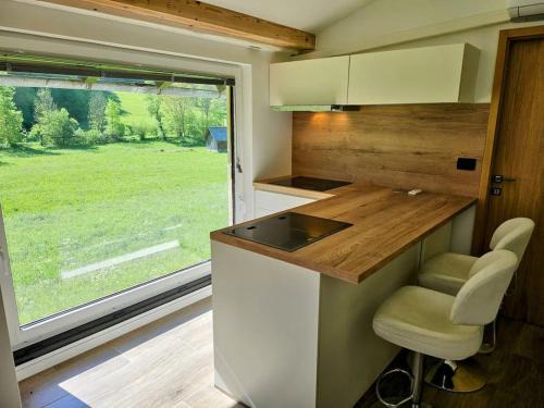 Bohinjska Bela Apartment | Studio apartment for 2, big windows, nature, balcony, 5min from Bled