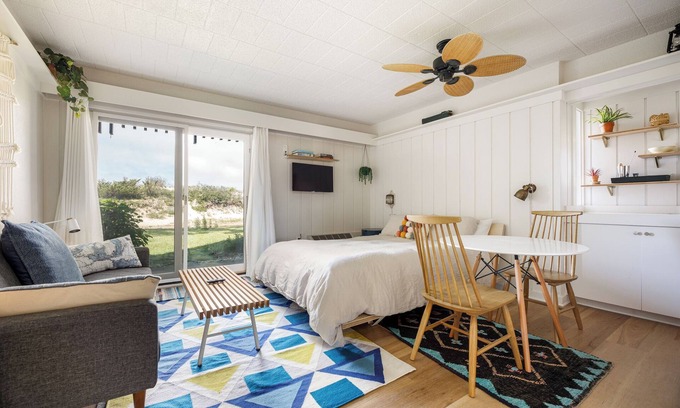 Maple City Condo | Studio Condo On the Water! Walkout to the Crystal River, steps from Lk Michigan