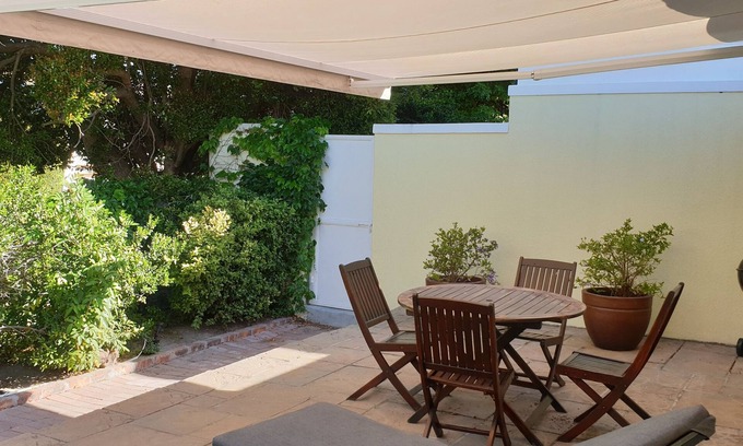 Constantia Ski Chalet | Studio in its own little house with nice terrace covered by a big awning