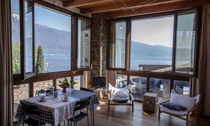 Tignale Apartment | Studio rustically furnished, overlooking lake and with terrace