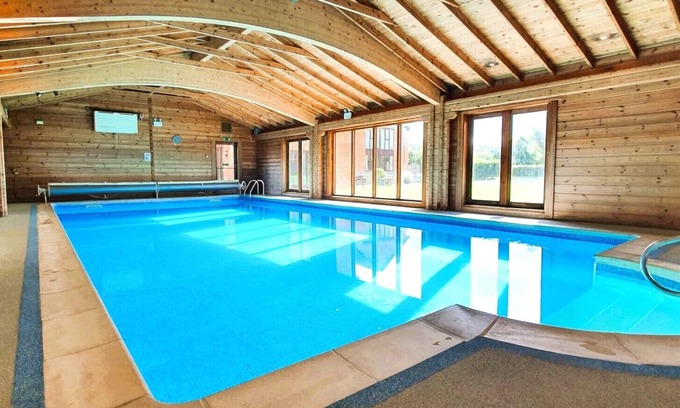Woolland House | Stunning Barn Conversion with Exclusive Bar, Pool, Hot Tub & Countryside Charm