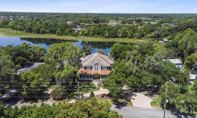 Heathrow House | Stunning 3 story lake house-Private lake access-Hot Tub-Canoe-Pool Table
