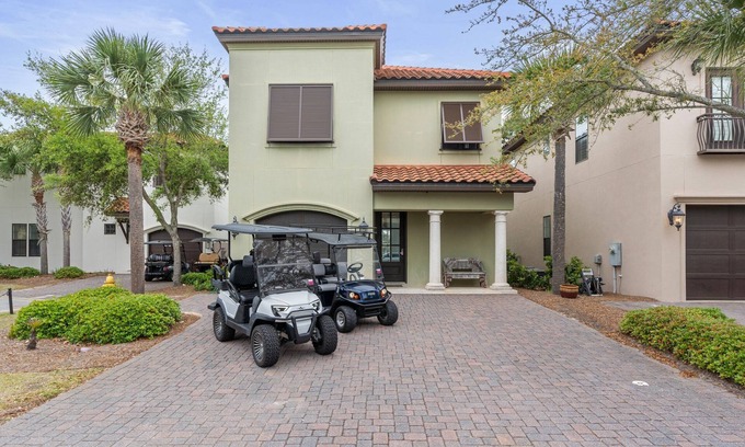 Villa Lago House | Stunning 4BR Beach Villa! 2 GOLF CARTS. Steps to Pool. Beach Tram. Near Wharf