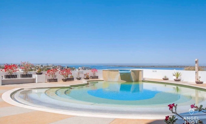Colina del Sol Condo | Stunning Bay Views, Pool, Near Malecón Waterfront
