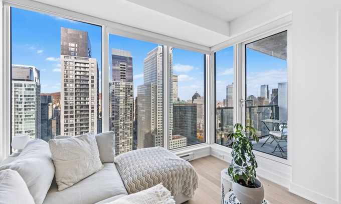 Montreal Apartment | Stunning city views luxurious condo in Montreal w/balcony & office space