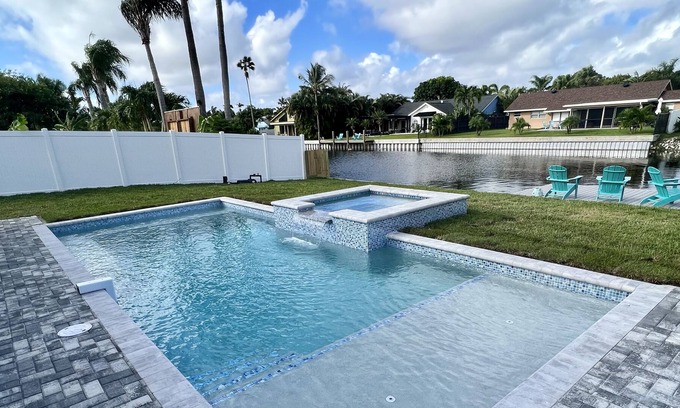 Tropic Palms House | Stunning Delray Beach Waterfront Escape w New Pool & Spa with Dock!