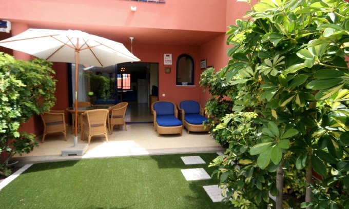 Costa Meloneras House | Stunning holiday cottage in the south of Gran Canaria with a garden and communal swimming pool