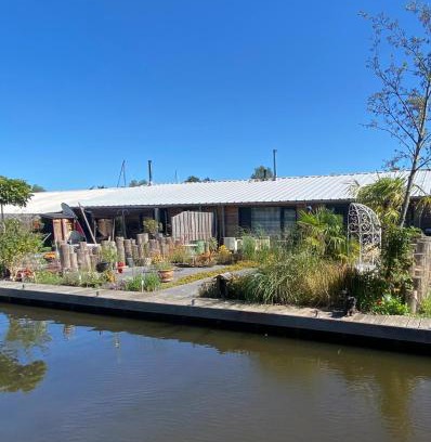 Aalsmeer House | Stunning Island Home with African Asian Vibe