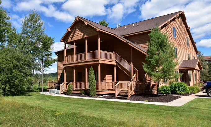 Mancelona Condo | Stunning Knotty Pine Condo at Schuss Mountain