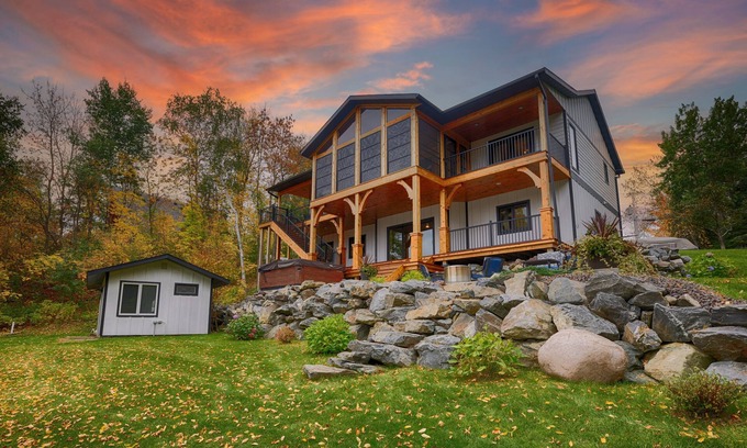 Tower House | Stunning Lakefront Retreat with Hot Tub & Fishing Paradise