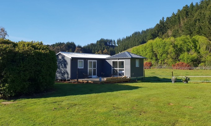 Shakespeare Bay Cottage | Stunning location garden setting, farmstead cottage!