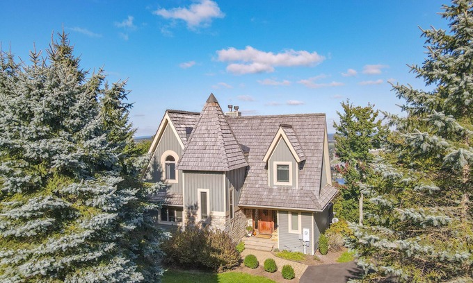 McHenry House | Stunning Mountaintop Home with Hot Tub and Lake Views