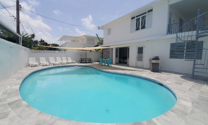 Isla Verde House | Stunning Pool House- Private - Sleeps 26- 5 minute walk to Isla Verde beach!