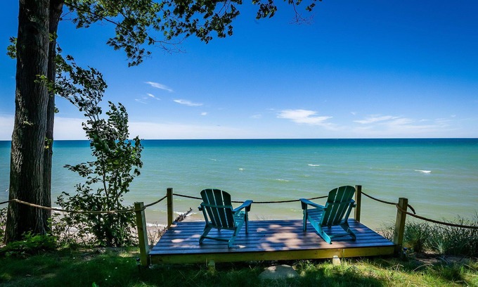 Montague House | Stunning renovated cottage with 150' of private sandy Lake Michigan beachfront!
