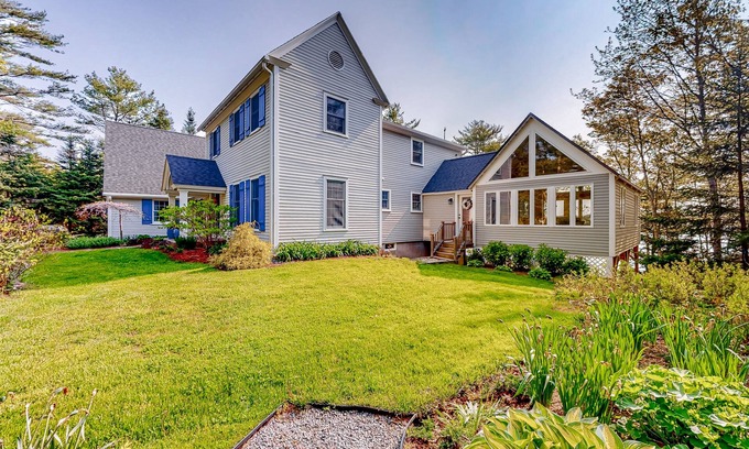 Westport House | Stunning riverfront gem with private dock, gourmet kitchen, and firepit