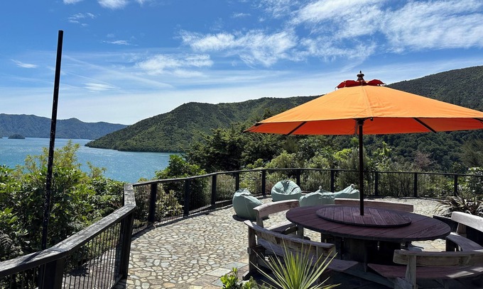 Whatamango Bay House | Stunning sea views from every room, an art filled retreat & drive on access