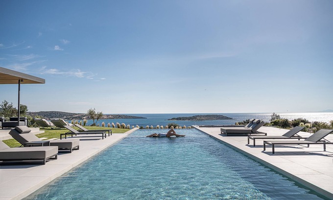 Marathi Villa | Stunning sea views, heated pool, fire pit, child pool: by etouri
