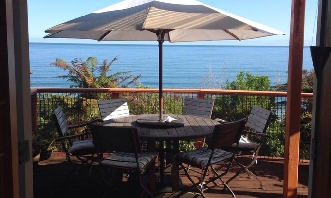 Paparoa National Park House | Stunning sea views, sunsets in a cosy holiday home suitable for families/couples