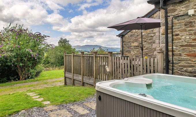 Eglwysbach House | Stunning villa for 4 people with hot tub, WIFI, terrace, pets allowed and parking