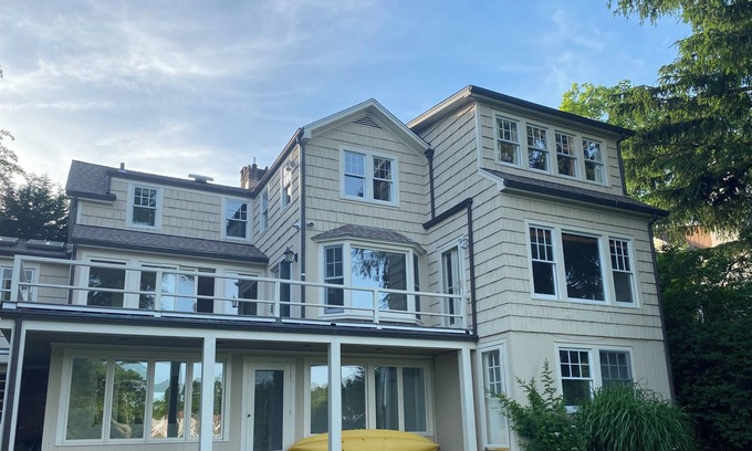 Riverside House | Stunning waterfront house with dock, walk to shops, restaurants, beach, train.