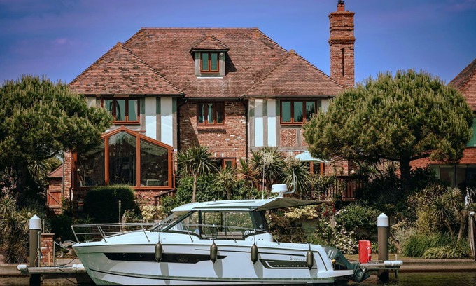 Eastbourne House | Stunning waterside six-bed house with water views, gardens and private jetty