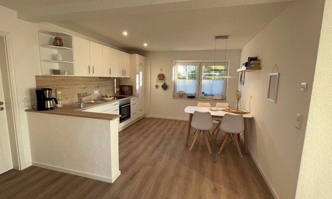 Gelting Apartment | Stuuv een - sauna, wood-burning stove, terrace, garden furniture, fenced, e-charging station