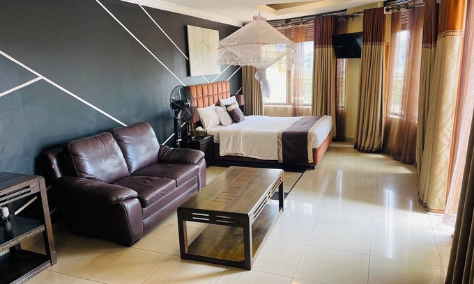 Kigali Apartment | Stylish City Oasis: 5 Location - Pool - City View