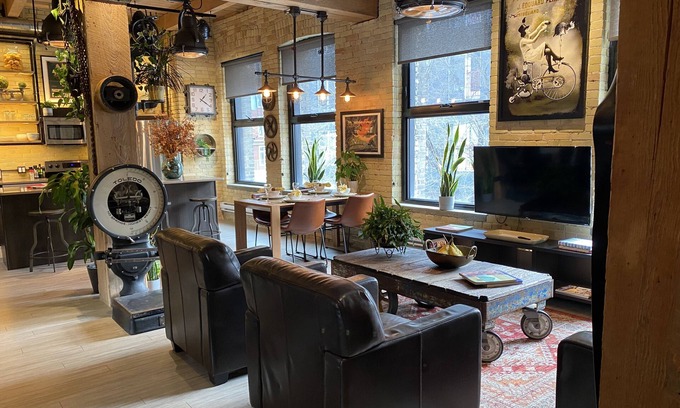 Exchange District Condo | Stylish Designer Loft, Historic Exchange District, Exposed Brick & High Ceilings