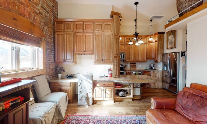 Historic Downtown Durango Apartment | Stylish, downtown condo w/loft, kitchen, & fireplace plus shared patio & grill