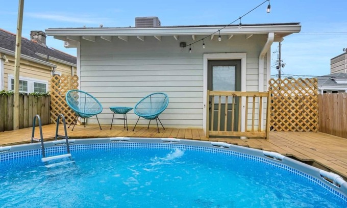 Tulane - Gravier House | Stylish NOLA Retreat: 3BR, 2BA Home. Exclusive Access, Pool, Walk to Streetcar, Superdom9