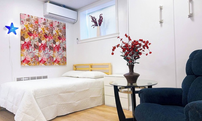 Queens Apartment | Stylish Studio Apartment on Main Street with Courtyard and Free Parking!