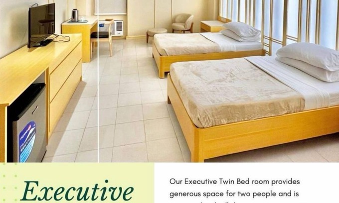 Downtown Tacloban Apartment | Stylish Studio with Twin Beds near Yolanda Shrine