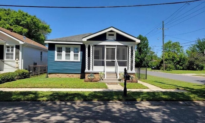 Chalmette House | Stylish Two-Bed Home with Spa Patio, Sunroom Gym